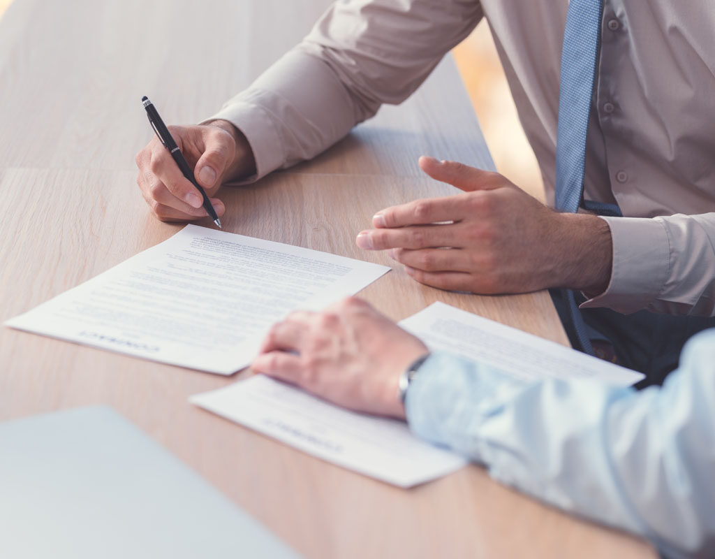 business people signing a contract